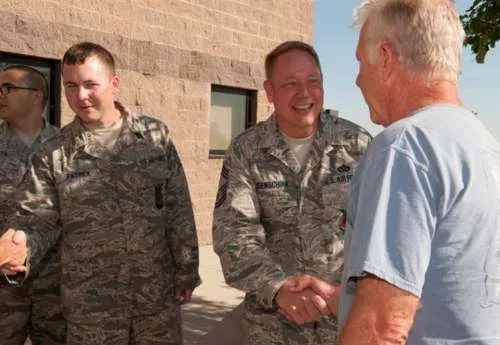 Service members reconnecting with their unit
